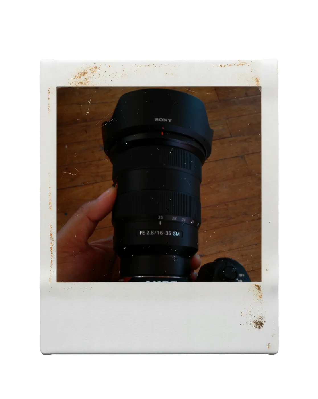 Polaroid: stadium track with photographer's bib